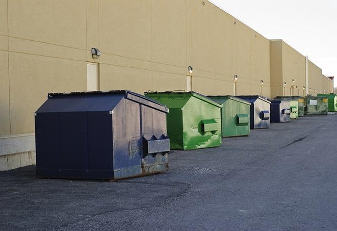 a row of industrial dumpsters for construction waste in Bear River WY